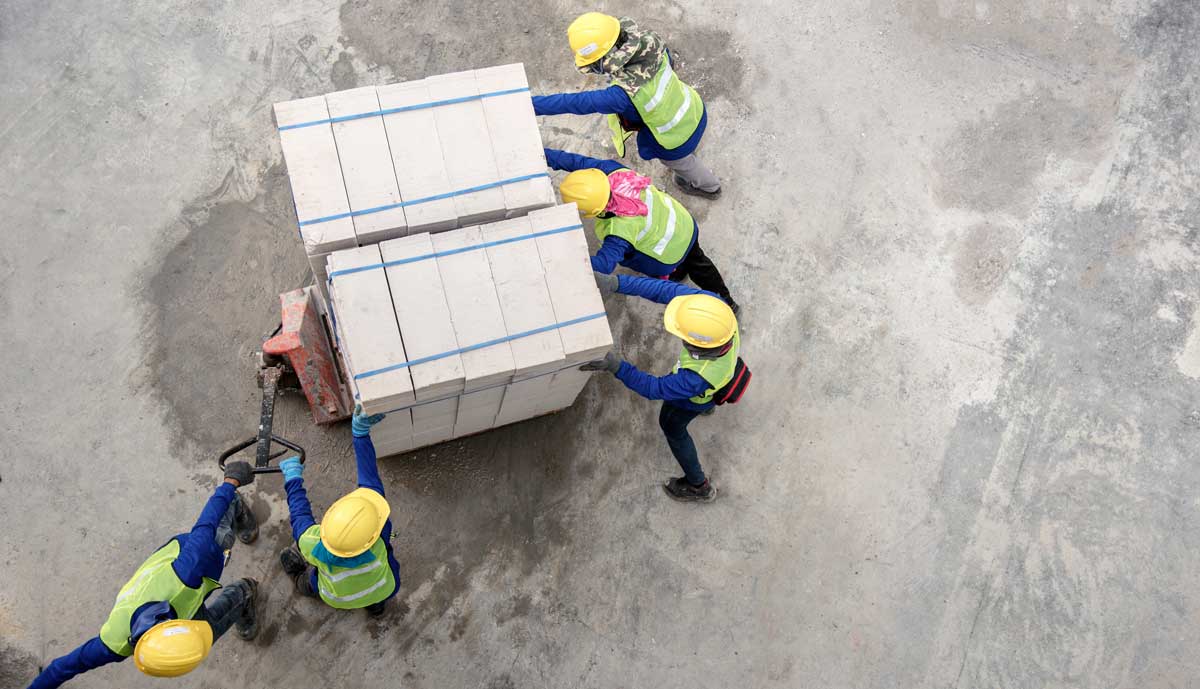 a construction crew delivering materials