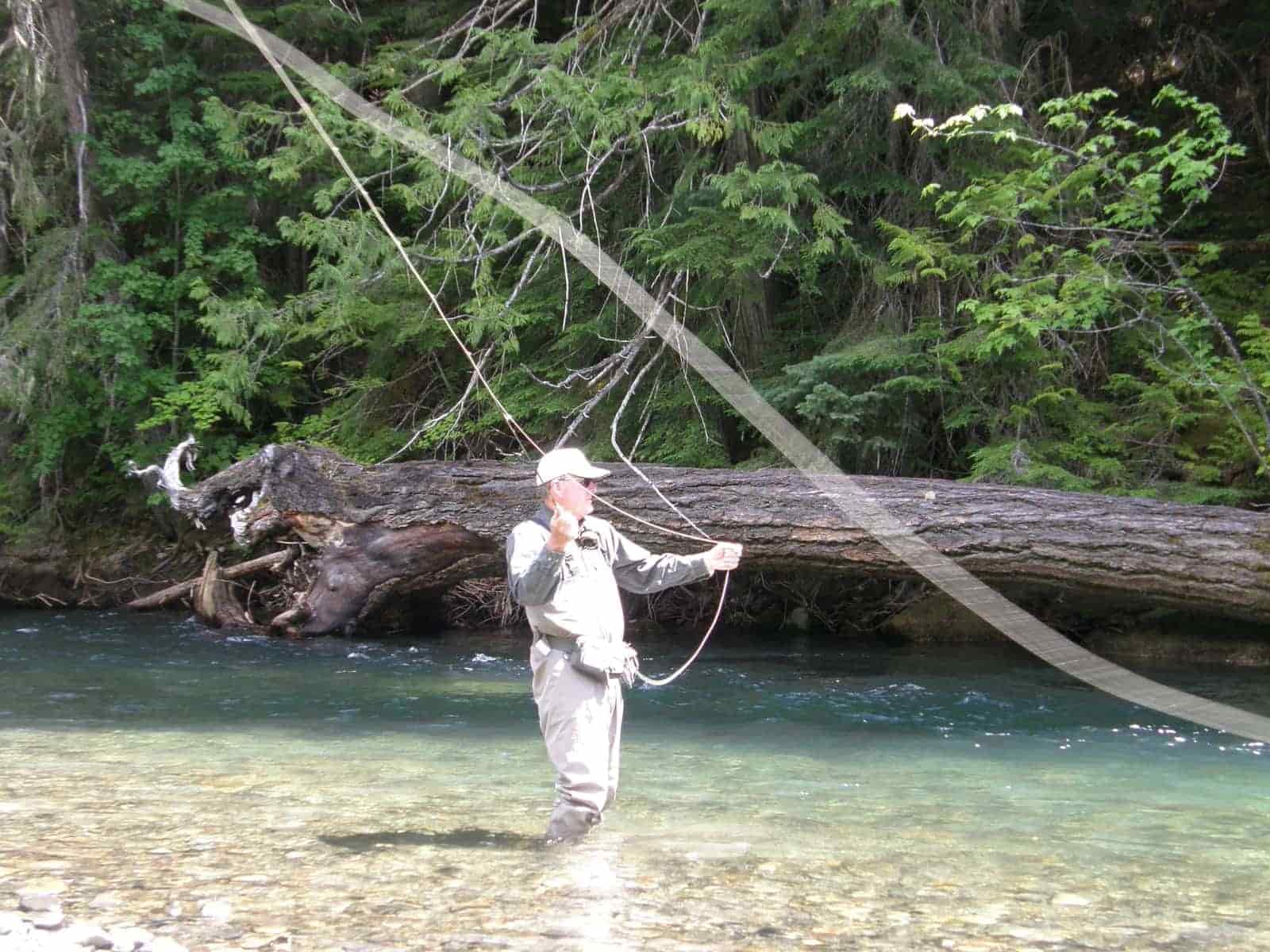 A man fly fishing in the river
