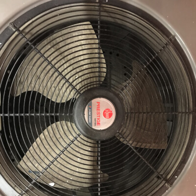 Fan of an AC unit blowing cold air conditioning air