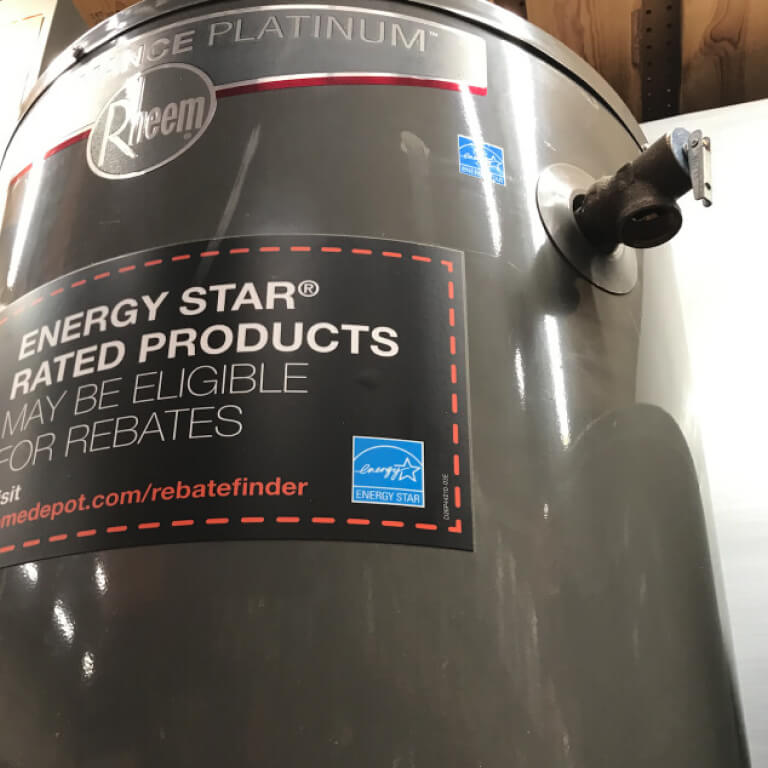 Westminster and Arvada top water heater technician with a photo of a hot water heater tank.