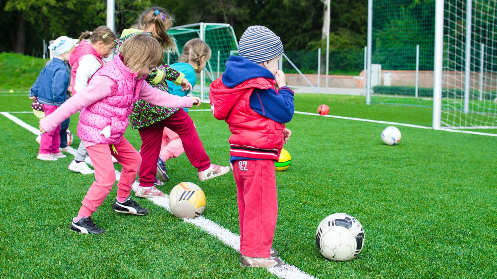 children playing football