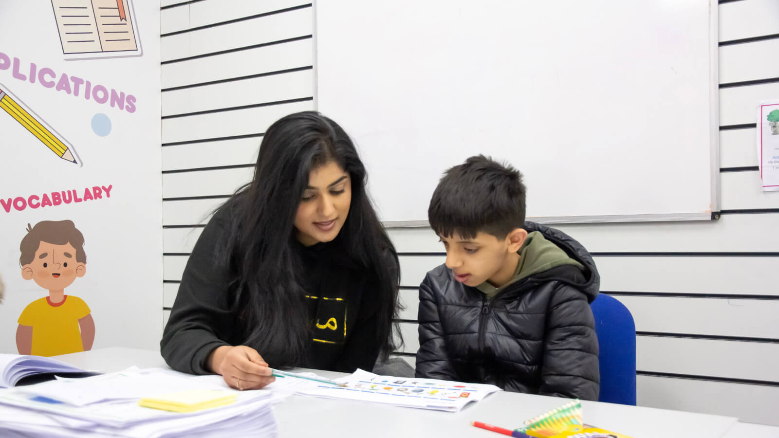 tutor and student working together in our Nelson learning centre