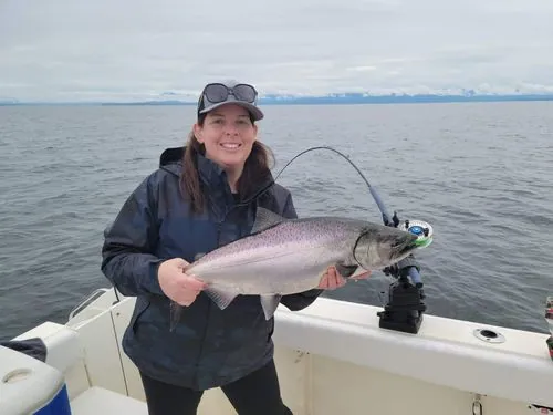 A woman holding a fish
