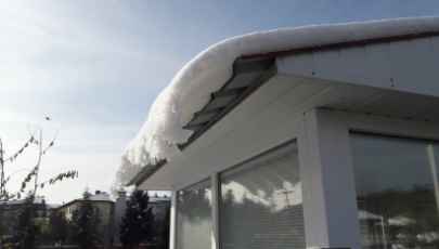house roof with heavy snow accumulation