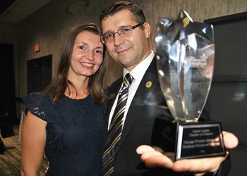 Lilian Cazacu holding awards