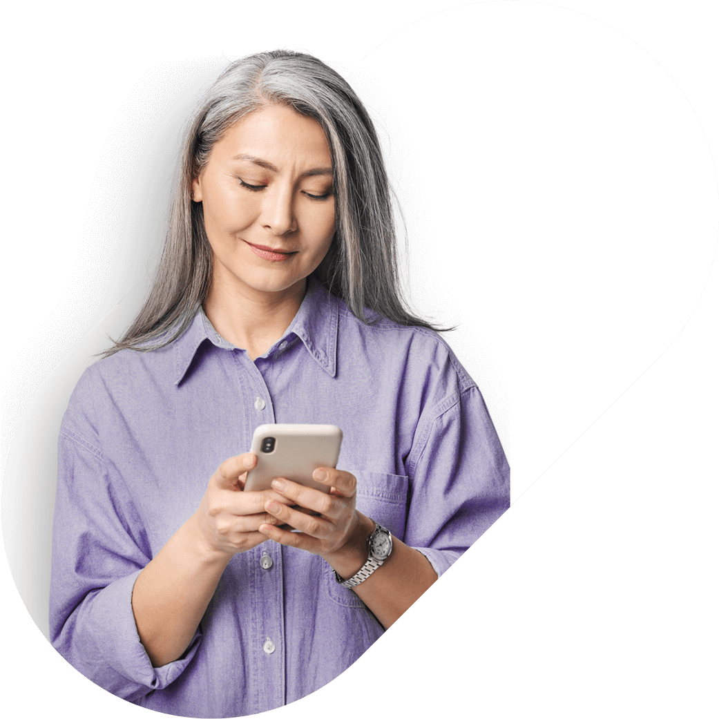 lady with gray hair holding phone