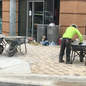 Sidewalk shoveling and snow plowing from providence property maintenance landscaping commercial snow removal