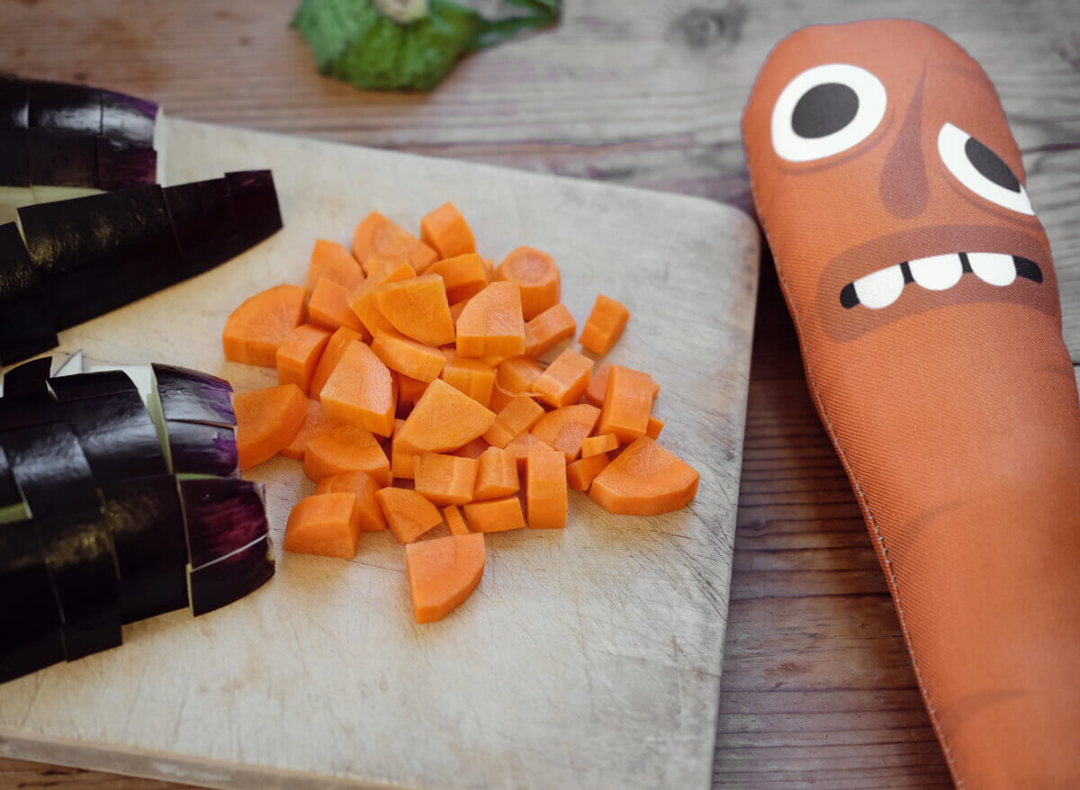 a diced carrot and a funny looking carrot
