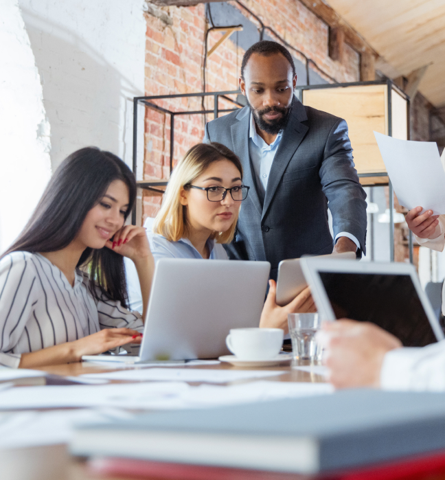 A business team meeting together