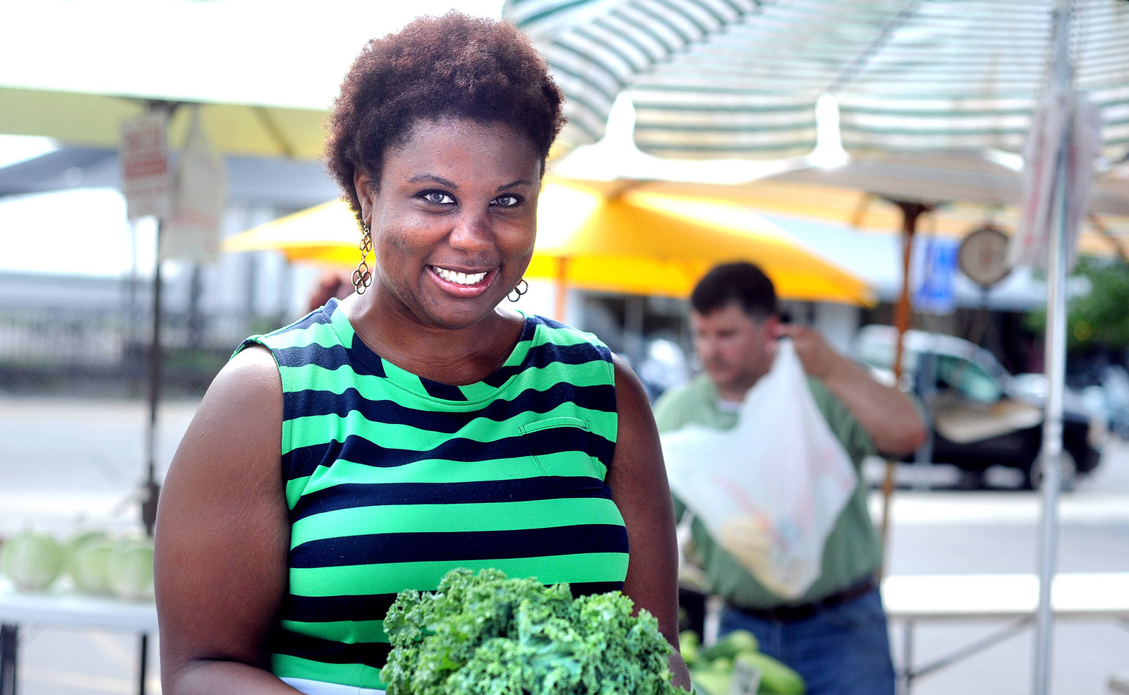 Smiling black woman at the market