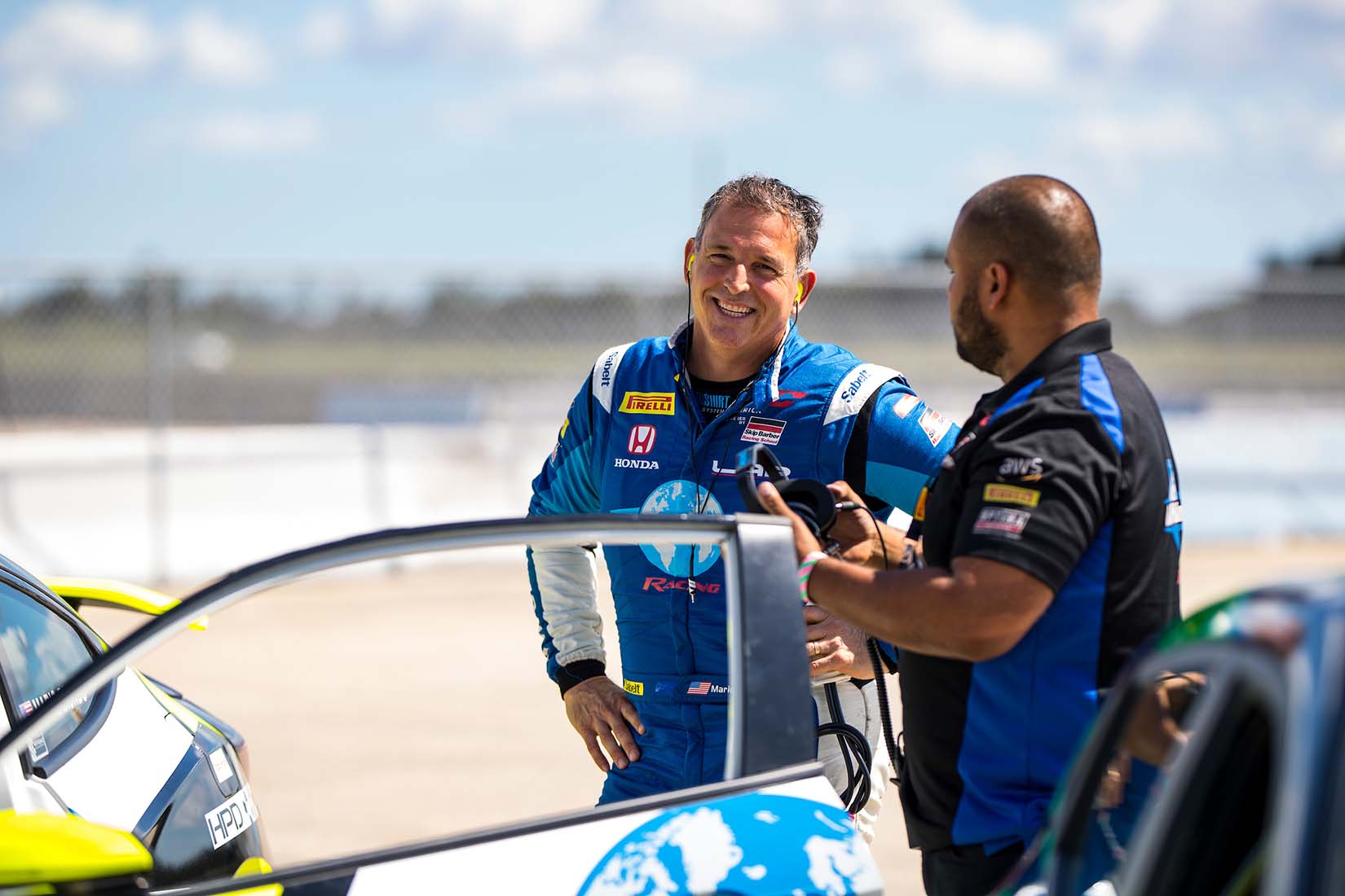 Driver and crew member chatting