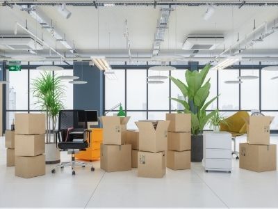 moving boxes stacked inside commercial office