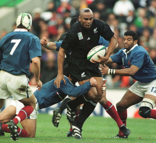 All Black Jonah Lomu attempts to split the French defence in the semi final of the Rugby World Cup at Twickenham, London, Sunday. France won 4331. (Photo by Ross Setford/Getty Images)