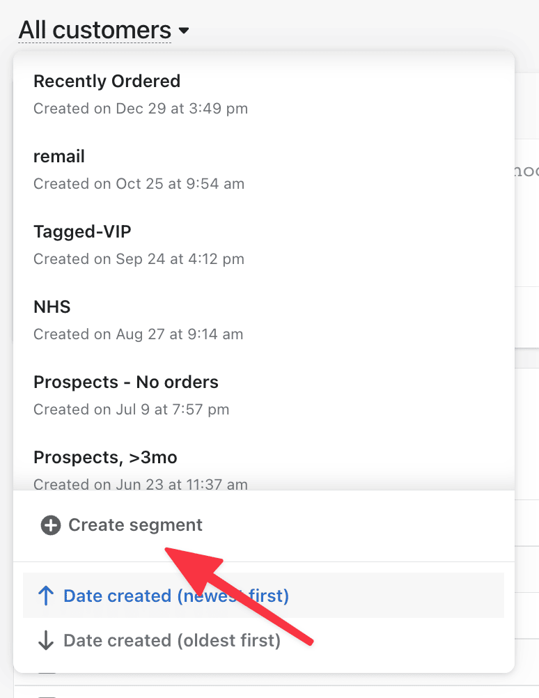 Screenshot from within Shopify app showing dropdown of all customer segments created, with arrow pointing to option to create a segment