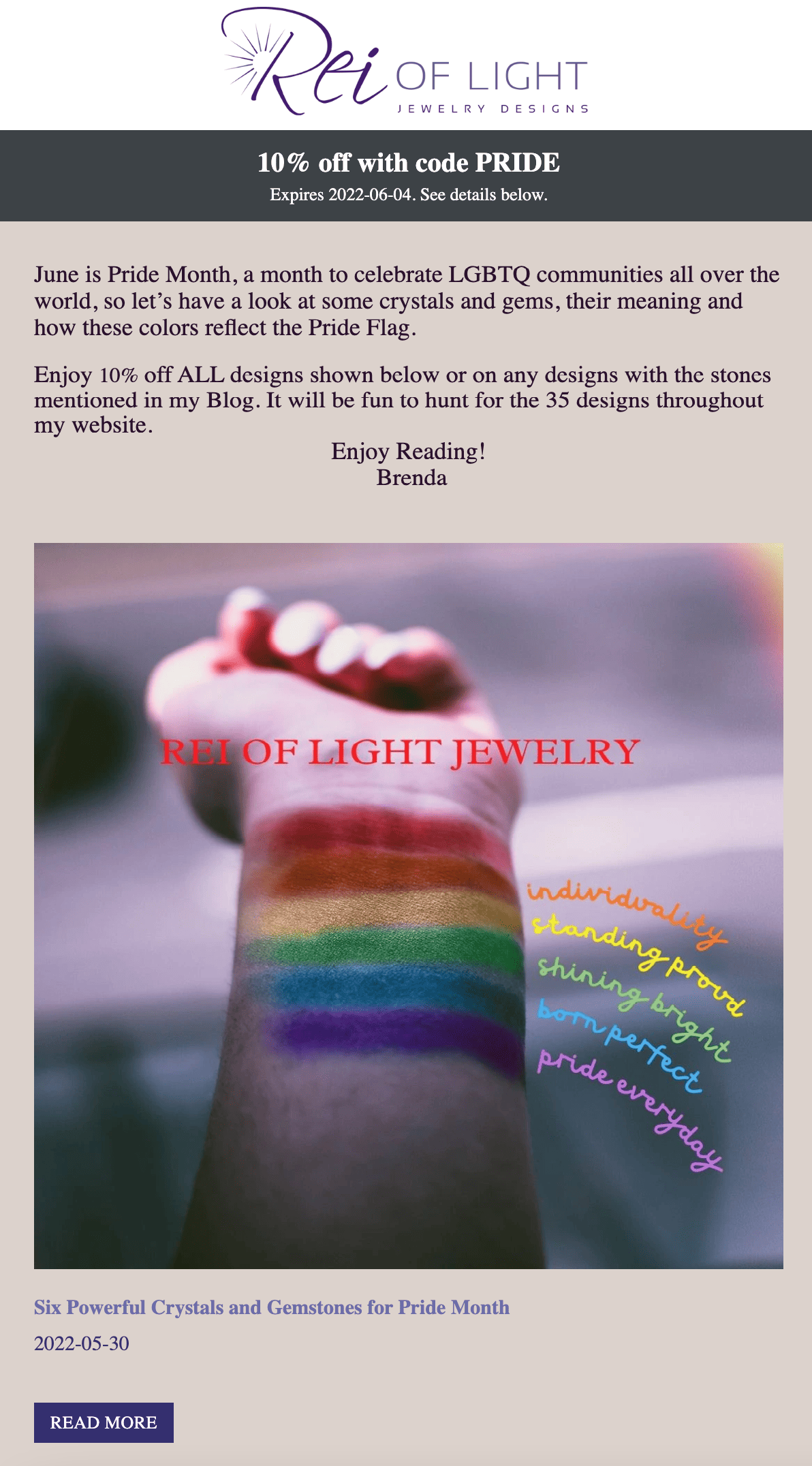 Partial image of an email, featuring an arm with a rainbow drawn on and words next to it