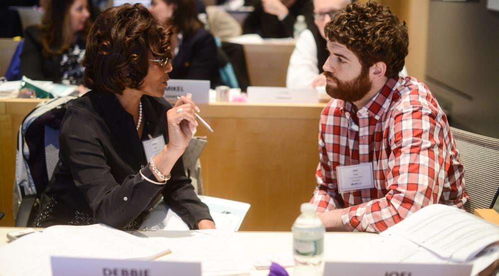 Two workshop participants having a discussion.