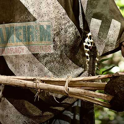 Close up of a man working in the forest