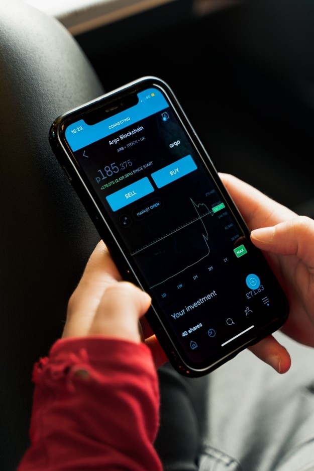 A girl using a crypto investment application