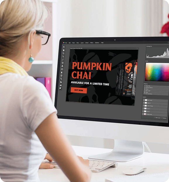 Woman creating mockups for Death Wish Coffee store.