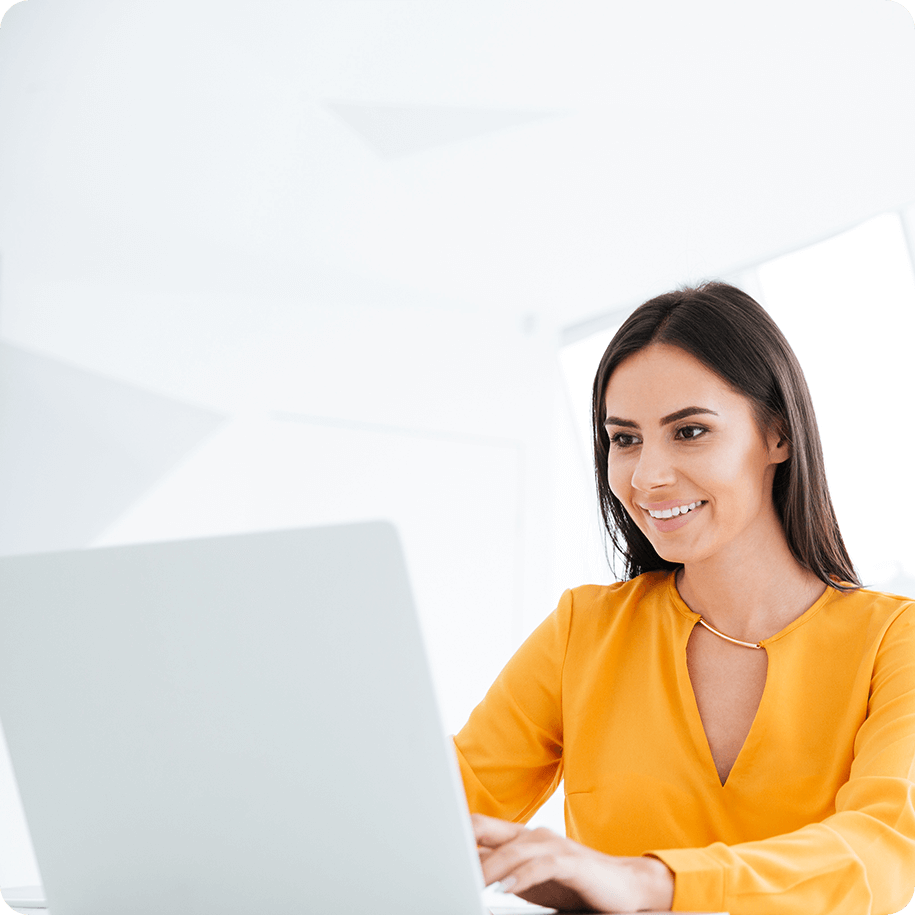 Woman using a laptop.