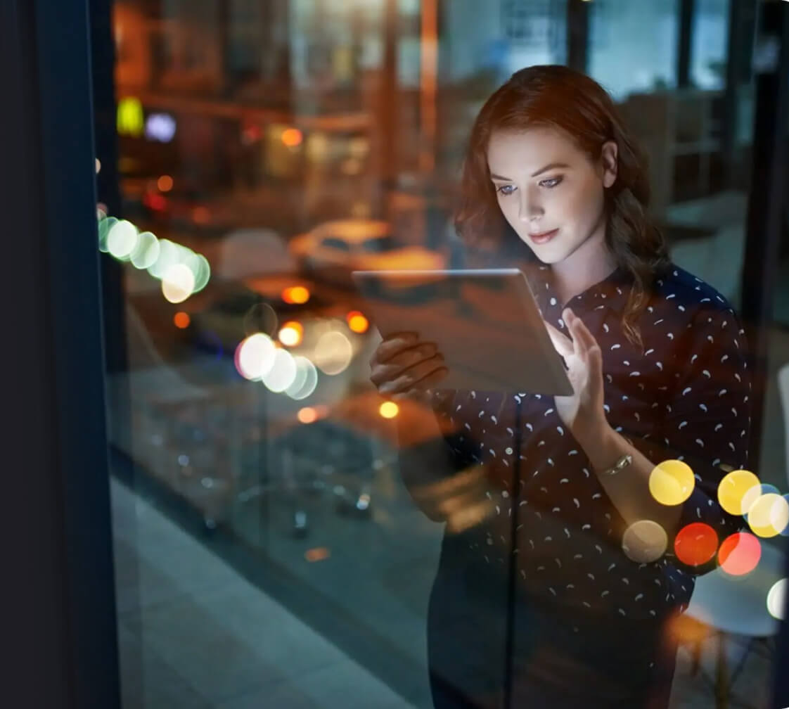 A woman using an ipad.