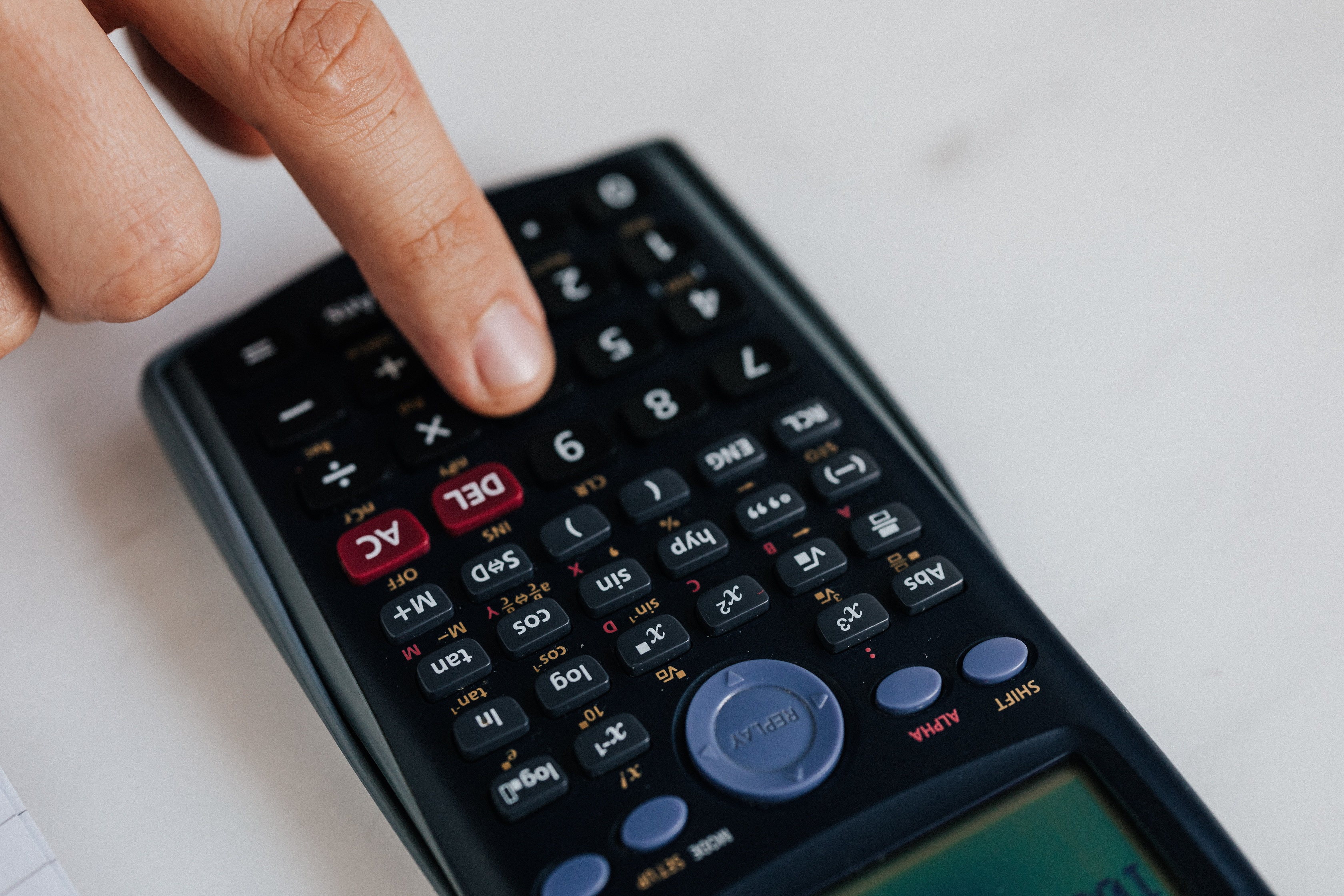 Person using calculator