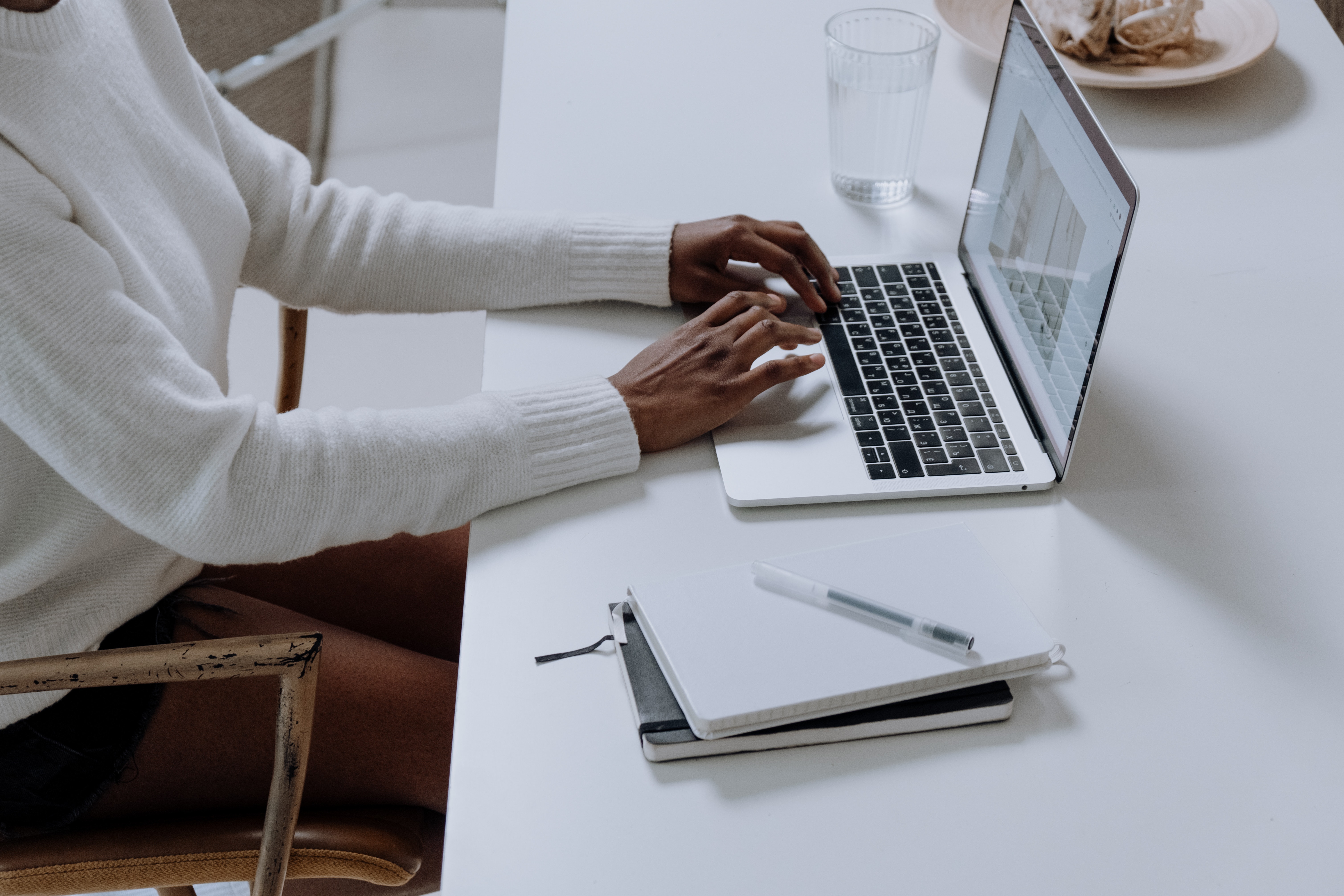 Woman looking at computer monitors