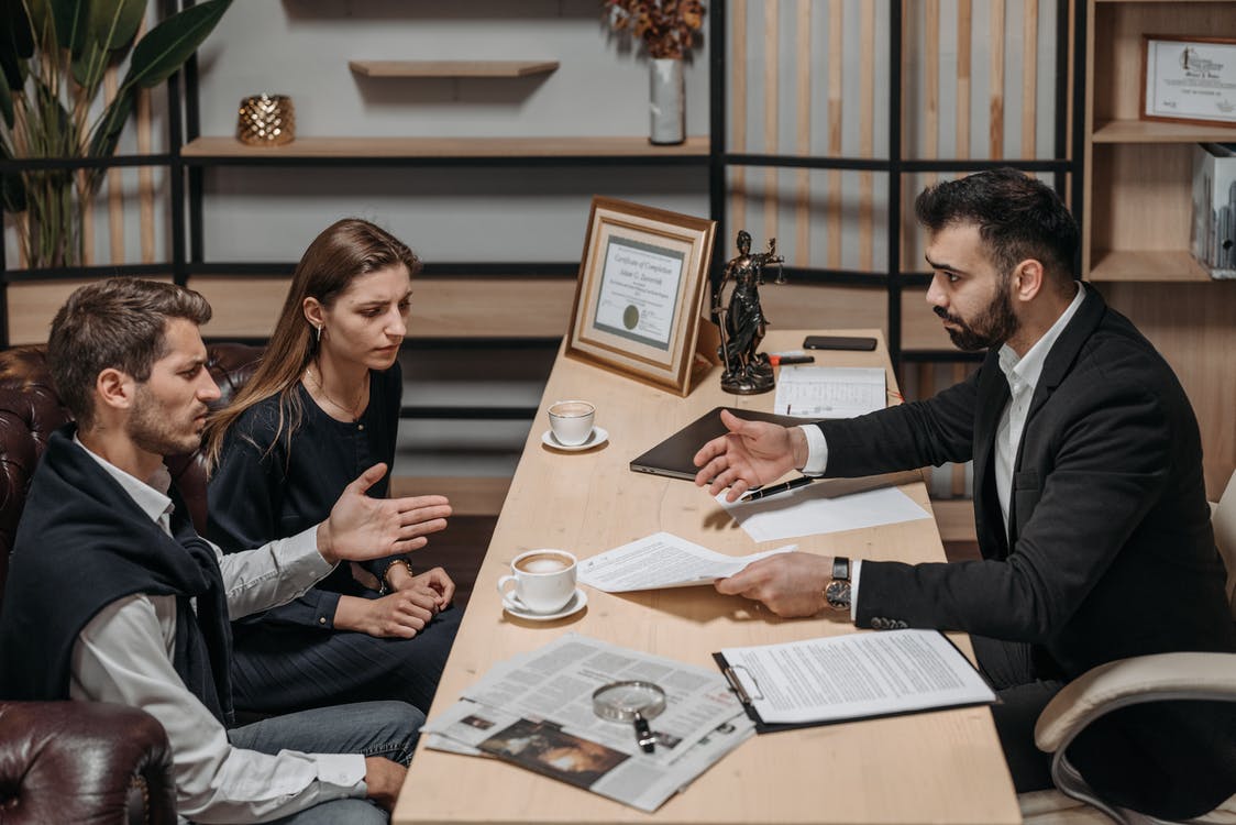 Businessman talking with clients
