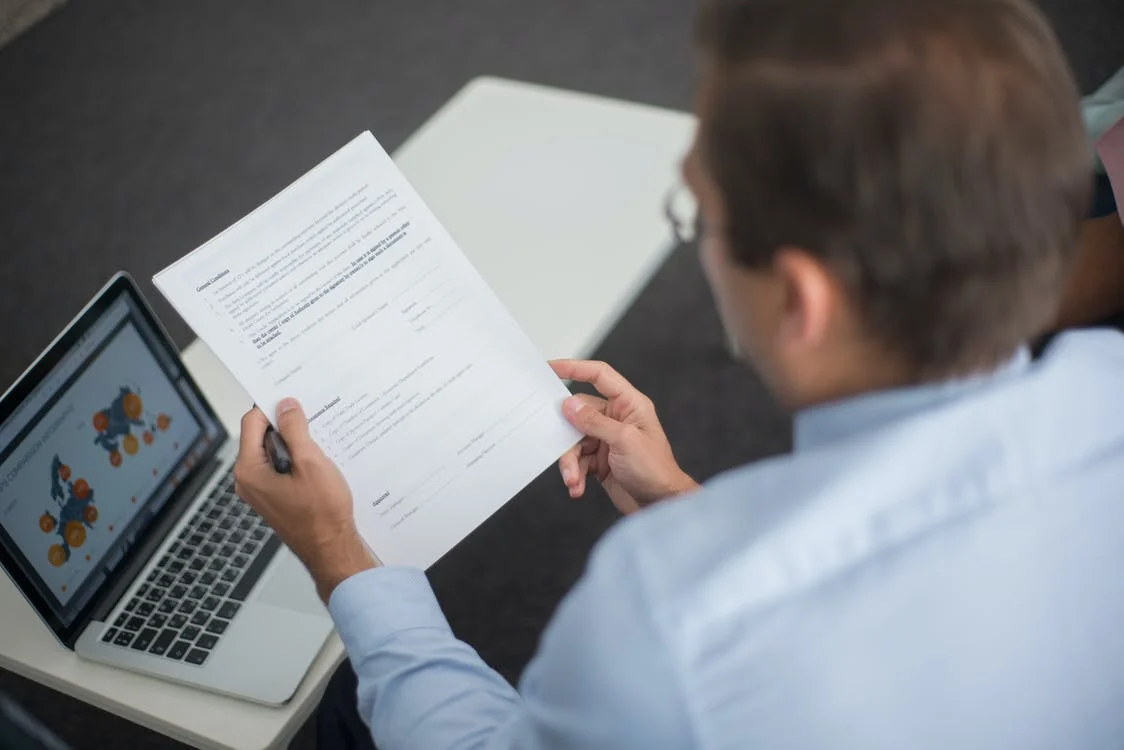 Man looking at contract