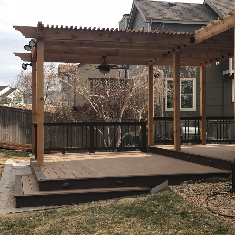 Multi-level Deck with Pergola over it and railing