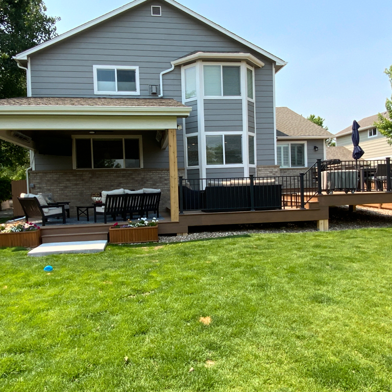 Beautiful Low Multi-Level partially Deck with Dining space and Hot tube space.
