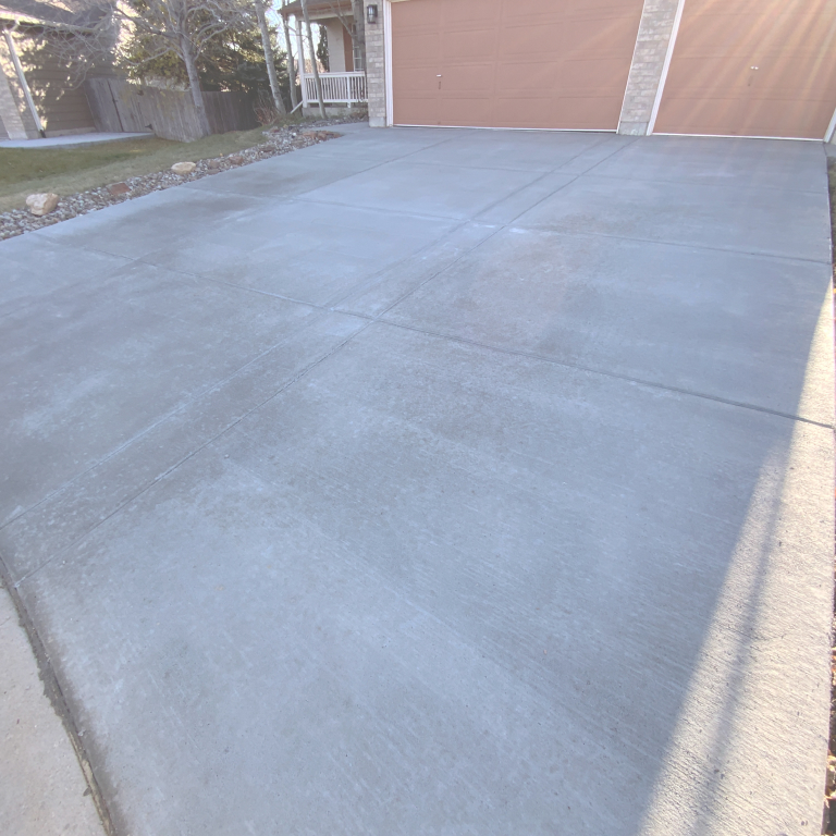 Driveway poured with gray Concrete