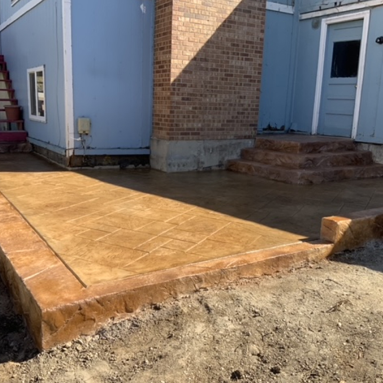 Beautiful Decorative Stamped Concrete Patio with Steps