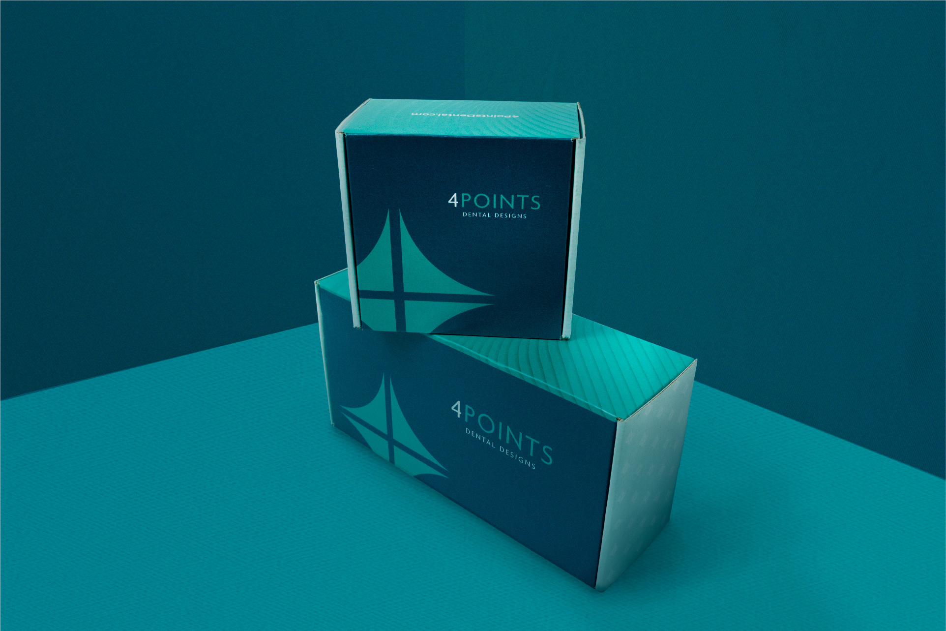 Two branded 4Points Dental Design boxes stacked on top of each other