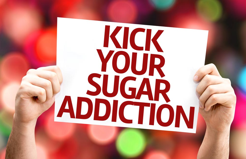 sign reading kick your sugar addiction