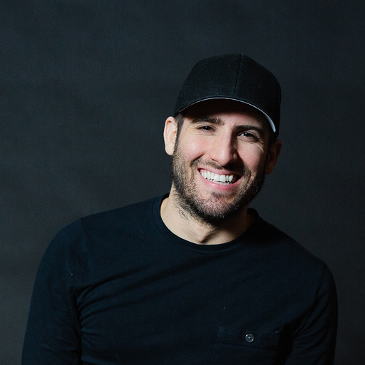 A headshot of Roger Figueiredo, VP of marketing at Hashtag Paid