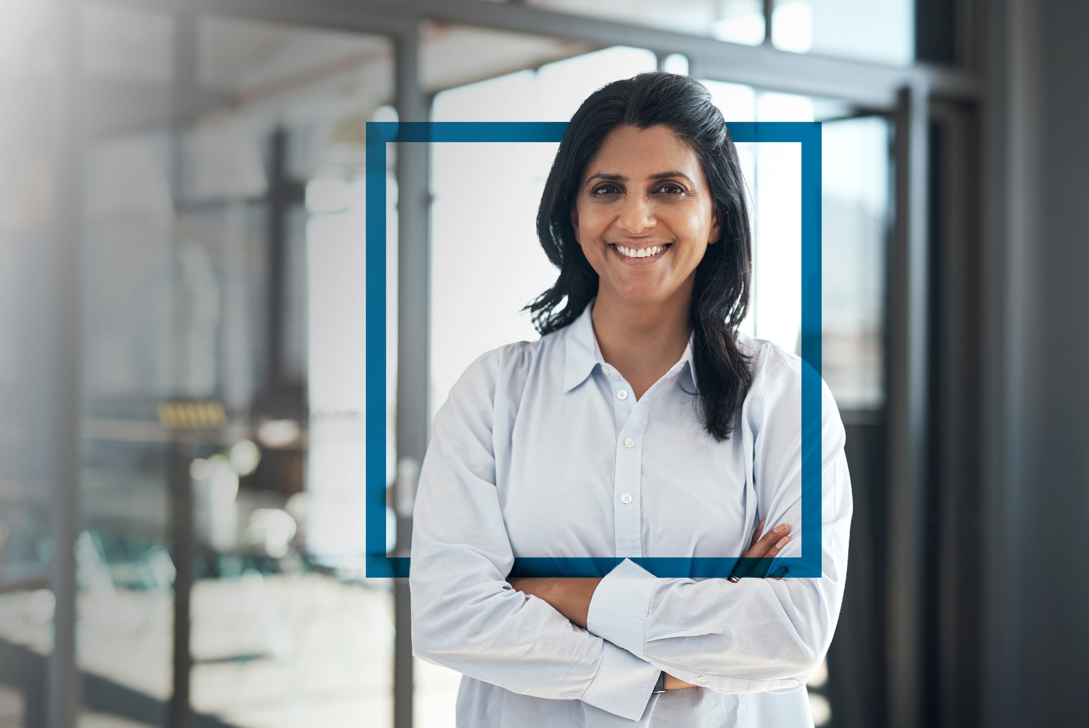 Business woman looking into camera