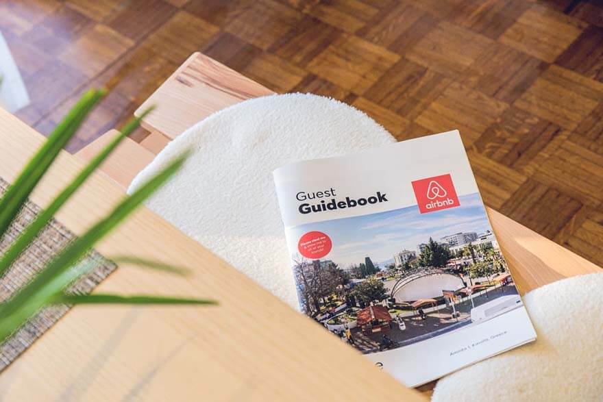 A magazine that is lying on top of a chair