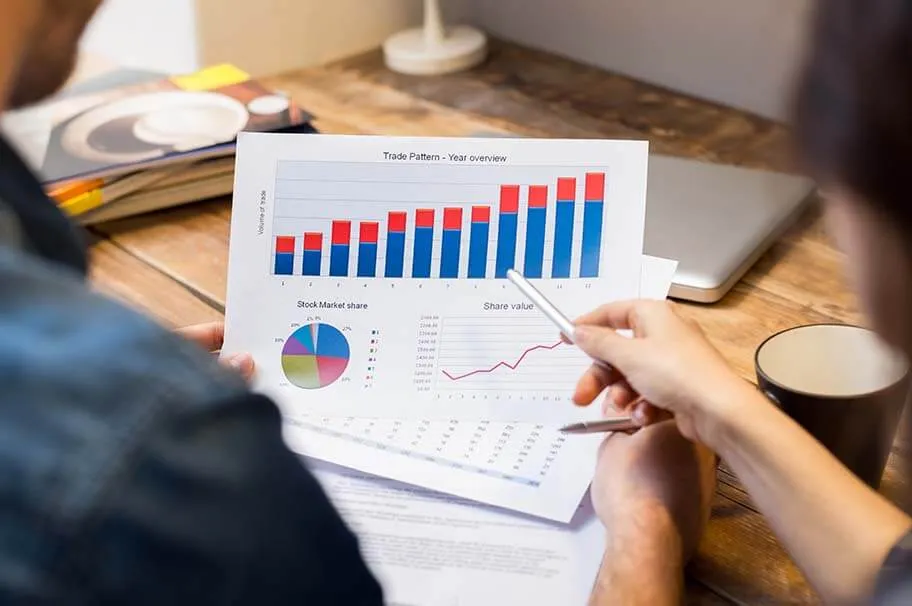 A person holding a graph