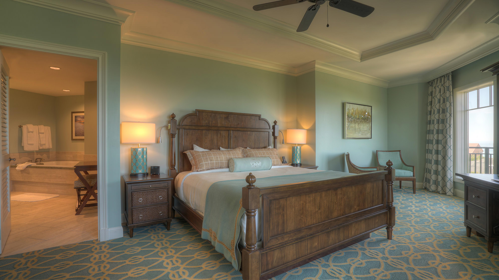 A studio suite with a private balcony and views of the Henderson Beach Park Preserve and the Gulf of Mexico at The Henderson