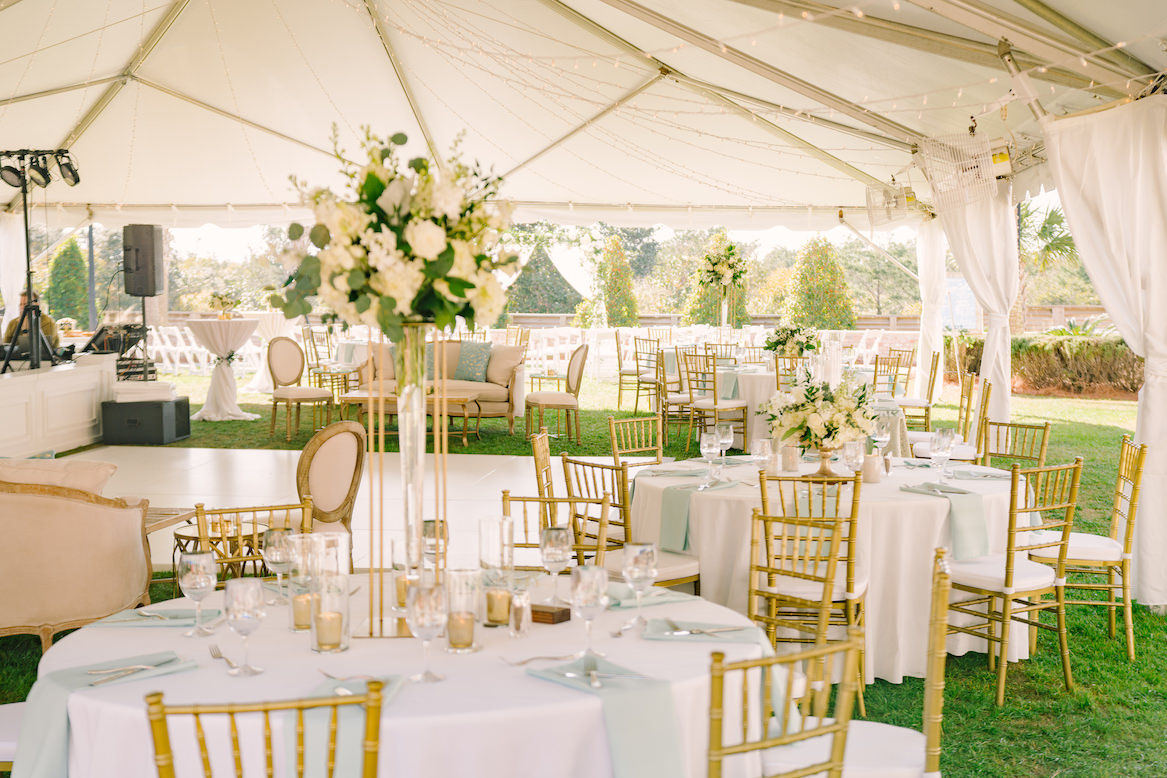The grand lawn, a lush green lawn with walking paths next to a pristine nature preserve