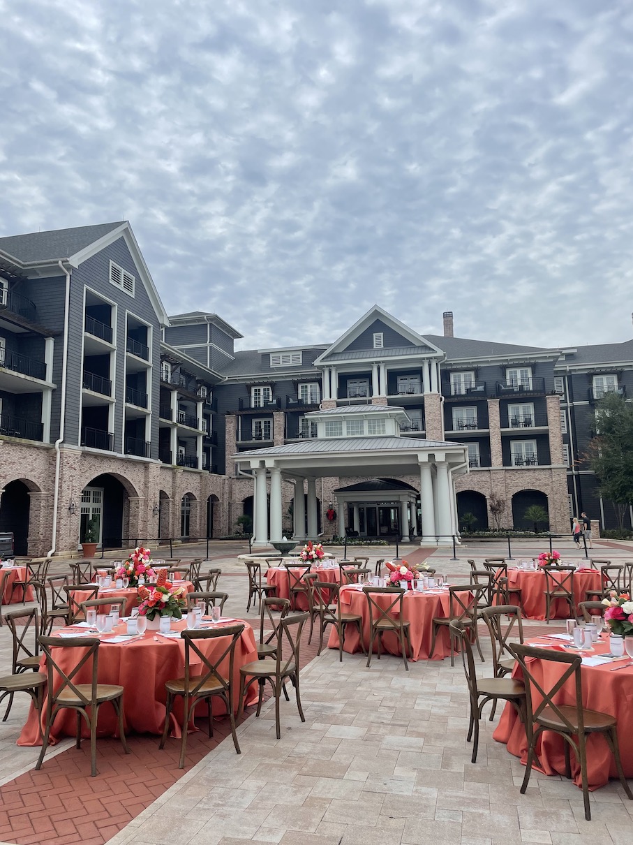 Tables and chairs set up on the elegant Grand Piazza at The Henderson, a venue for up to 250 guests.