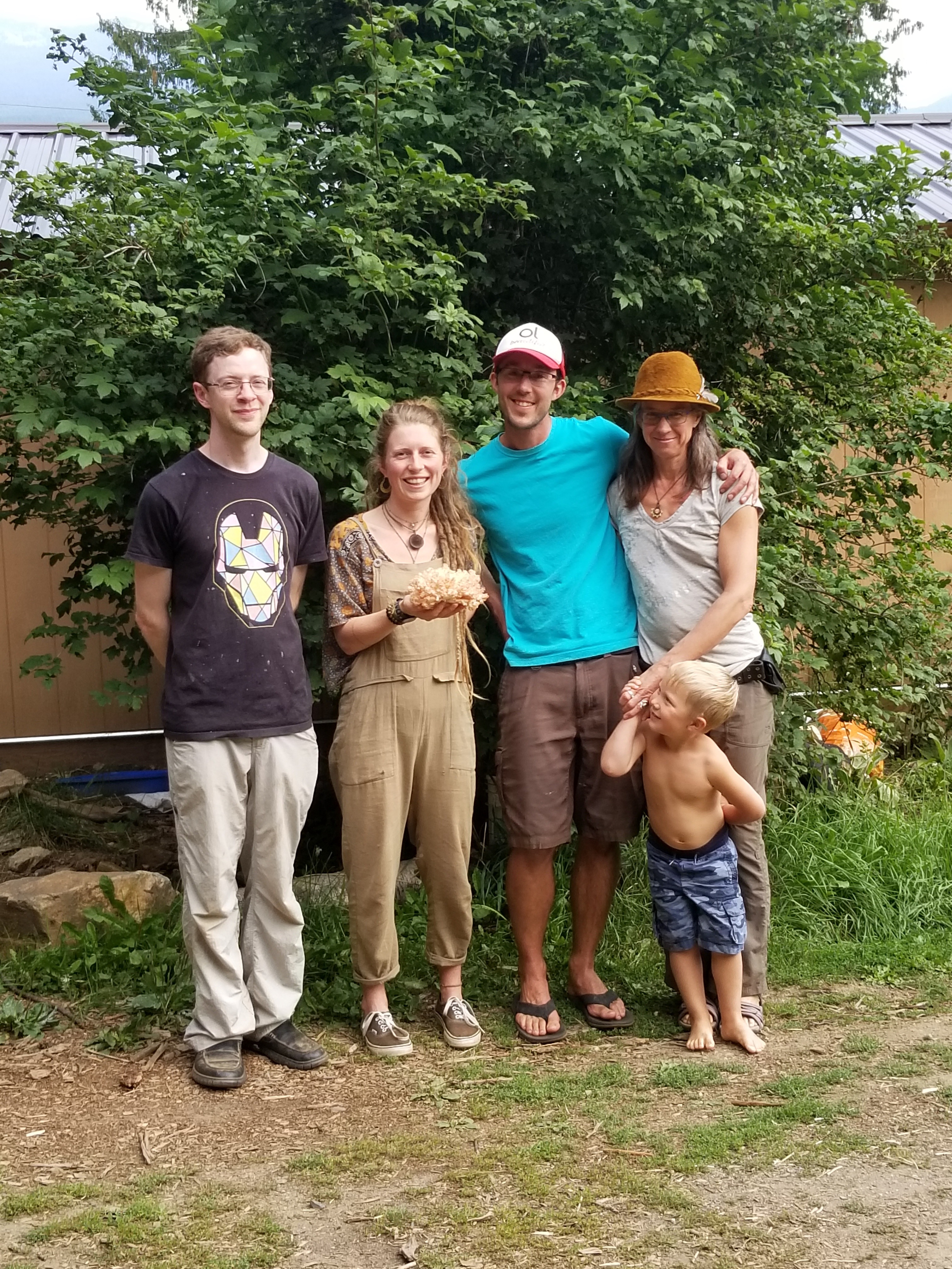 Picture Of Mushroom Growing team