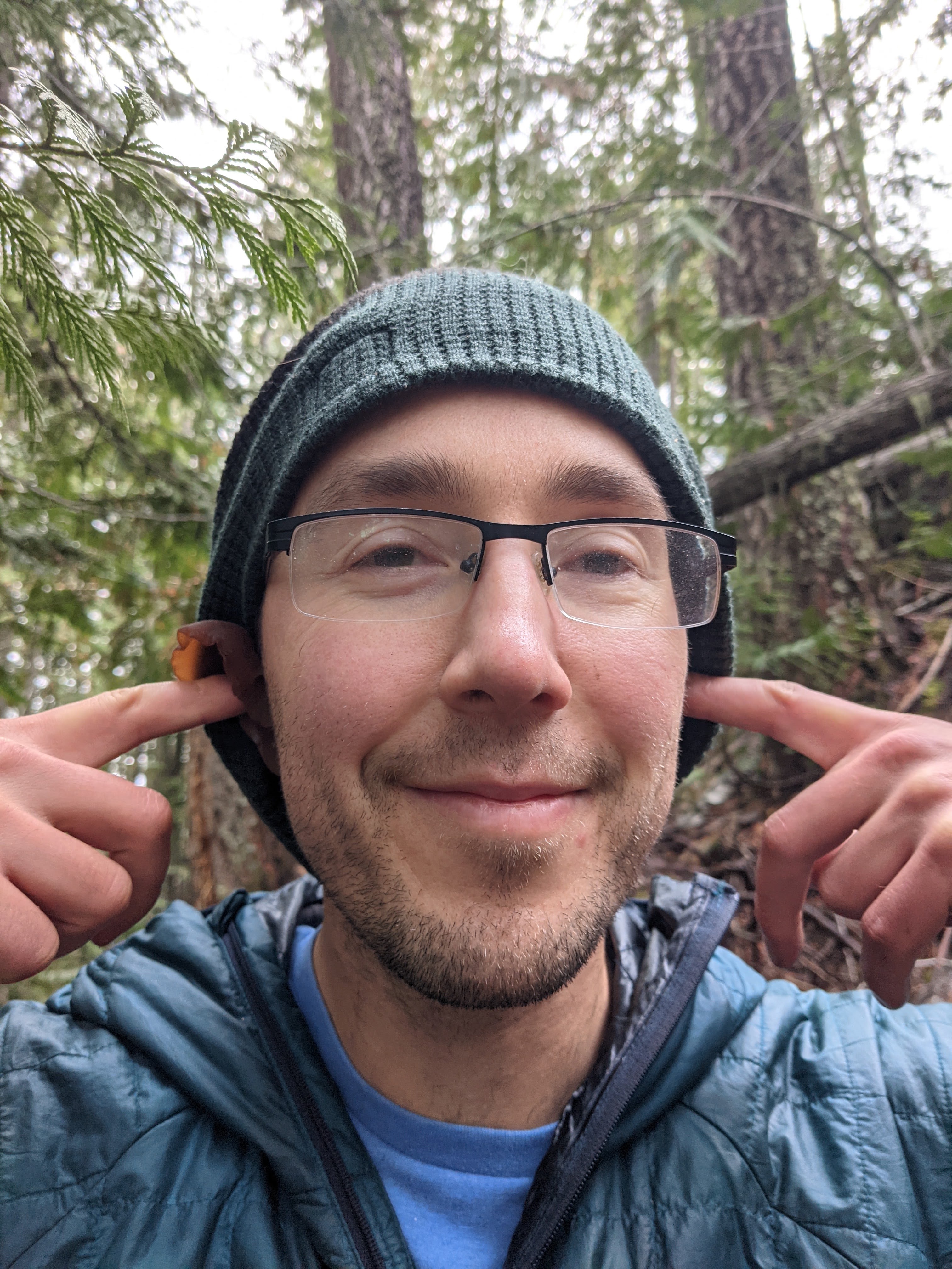 man with mushrooms in ears