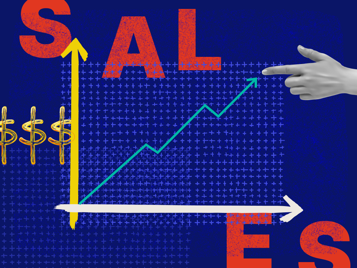 Hand pointing at a graph figure rising with the word 'sales' spelled out around it