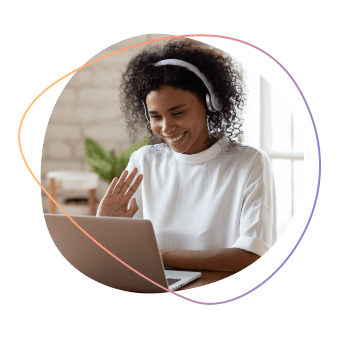 A woman attending a telehealth appointment on her laptop
