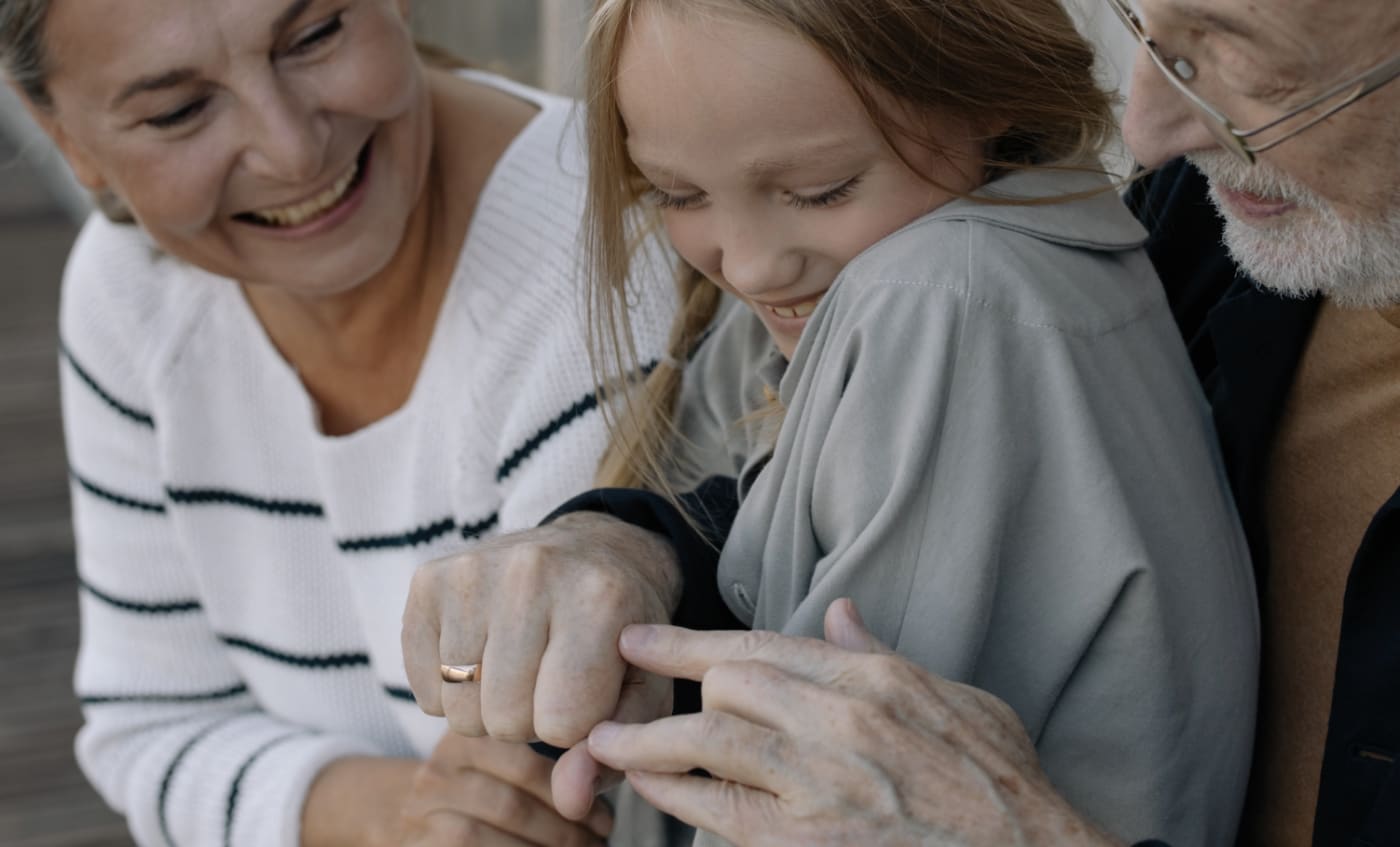Grandparents sharing a moment with their grandchild