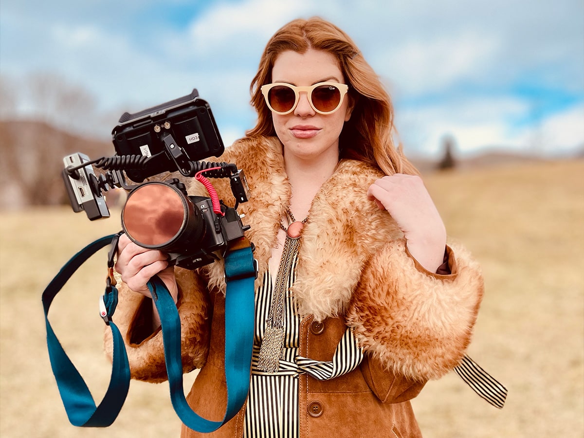 Vada posing with a camera