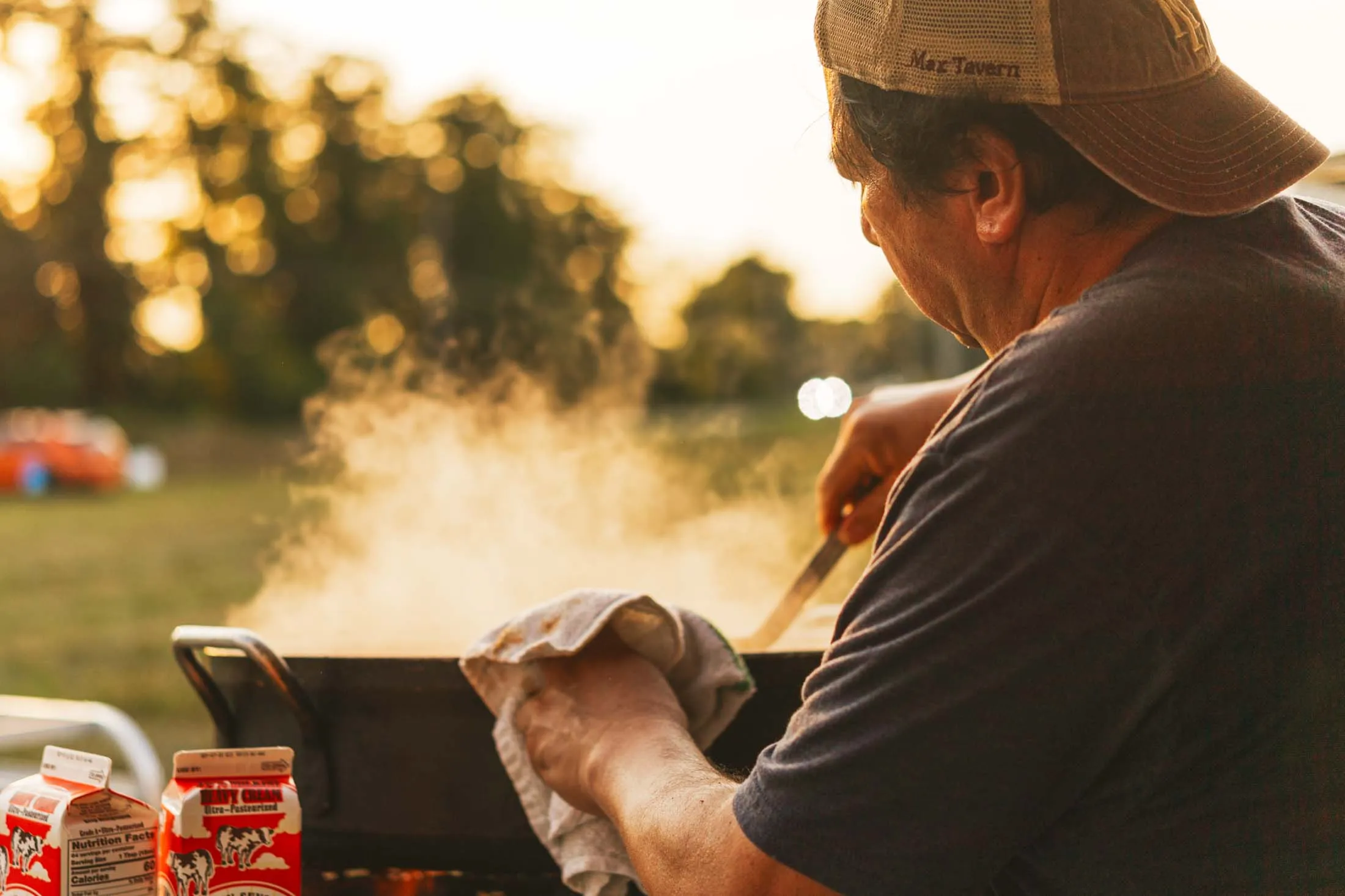 Chef stirring the pot of food