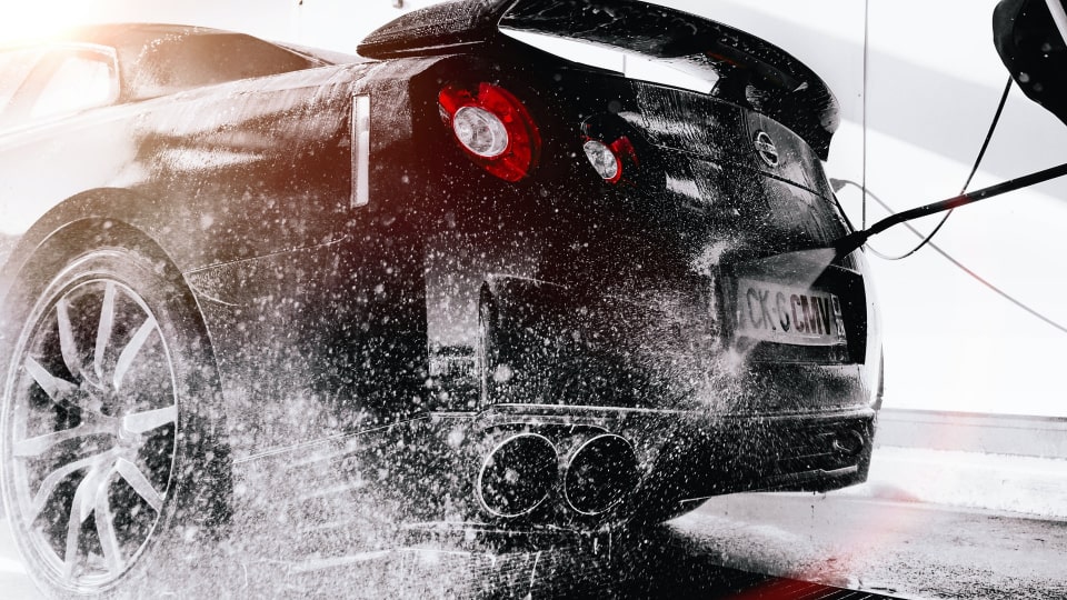 Black car gets polished